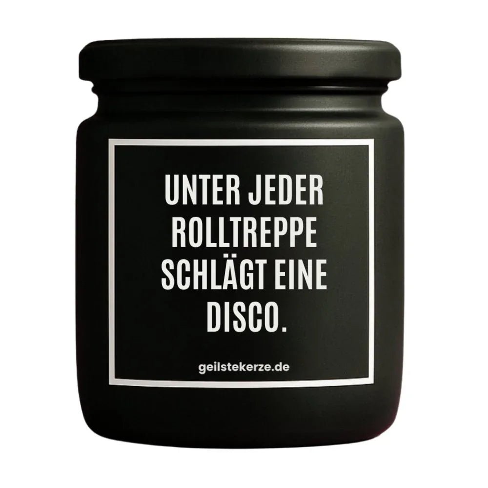 Vegane Bio-Kerze mit Spruch – UNTER JEDER ROLLTREPPE SCHLÄGT EINE DISCO.